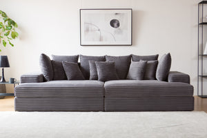 Gran sofá de pana gris ambiente Cardiff concept u