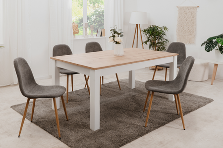 Mesa de comedor de madera blanca y skadar.