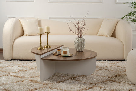 Mesa baja redonda con podio en nogal blanco con ambiente Xyn concept u