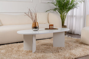 Mesa de centro ovalada blanca con ambiente Azos concept u