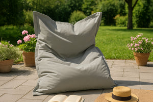 Puf rectangular gris ahumado con ambiente moku concept u