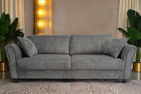 Sofá recto de 4 plazas en pana gris con ambiente lucerne concept u