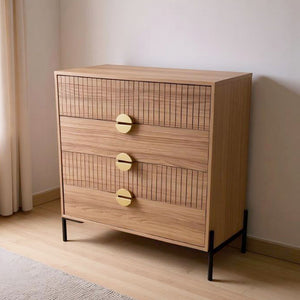Cómoda 4 cajones con decoración de madera estriada y tiradores dorados 84 cm Vallo vista 3/4