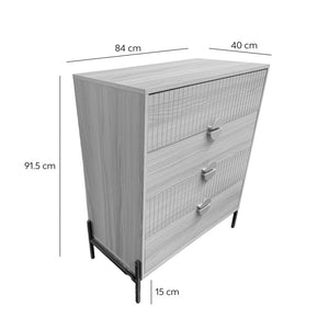 Cómoda 4 cajones con decoración de madera estriada y tiradores dorados 84 cm Vallo dimensiones