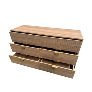 Cómoda de 6 cajones con decoración de madera acanalada y tiradores dorados 124 cm Vallo packshot abierto