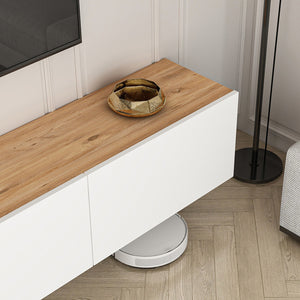 Detalle del tablero efecto madera y puertas blancas del mueble TV