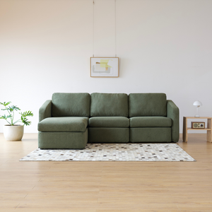 Sofá modular verde Konekt ambiente frontal 4 plazas esquina izquierda Concept Usine
