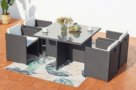 Conjunto de jardín encastrable para 4 personas de resina trenzada Negro y Blanco